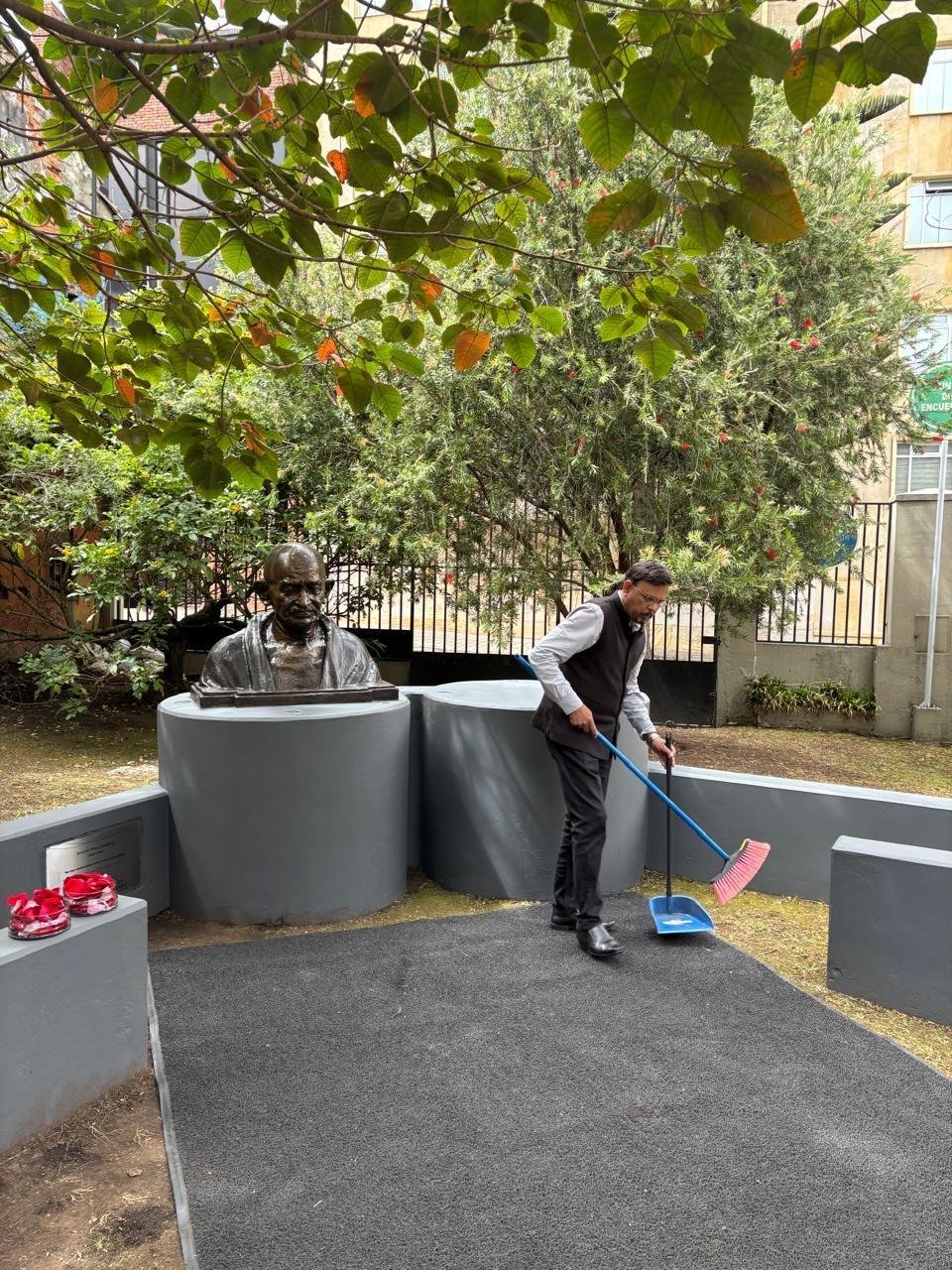As part of #GandhiJayanti2026, the officials of the Embassy of India in Bogota undertook a cleaning campaign at the Gandhi Garden at Jorge Tadeo Lozano University