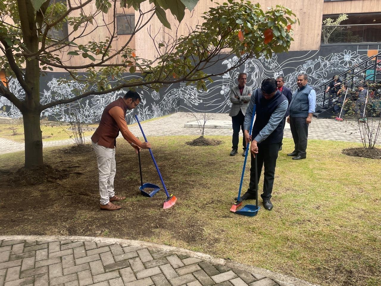 As part of #GandhiJayanti2026, the officials of the Embassy of India in Bogota undertook a cleaning campaign at the Gandhi Garden at Jorge Tadeo Lozano University